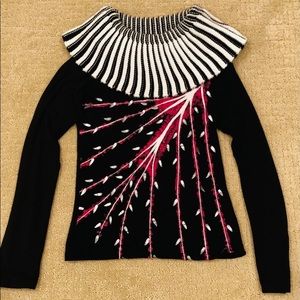 Black t-shirt with knitted striped collar.